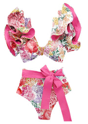 Floral bikini set with pink accents on a white background