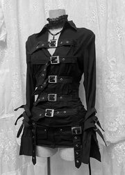 Black gothic-style long-sleeve top and matching shorts set displayed on a mannequin torso, featuring multiple horizontal straps, silver-tone buckles, eyelets, and lace-up details, photographed against a white lace curtain backdrop.