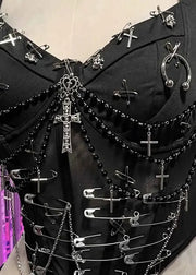 Black corset with metal hardware and chains on a mannequin against a colorful background