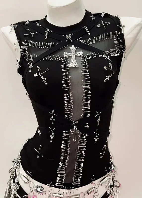 Black corset with silver embellishments on a mannequin against a light background