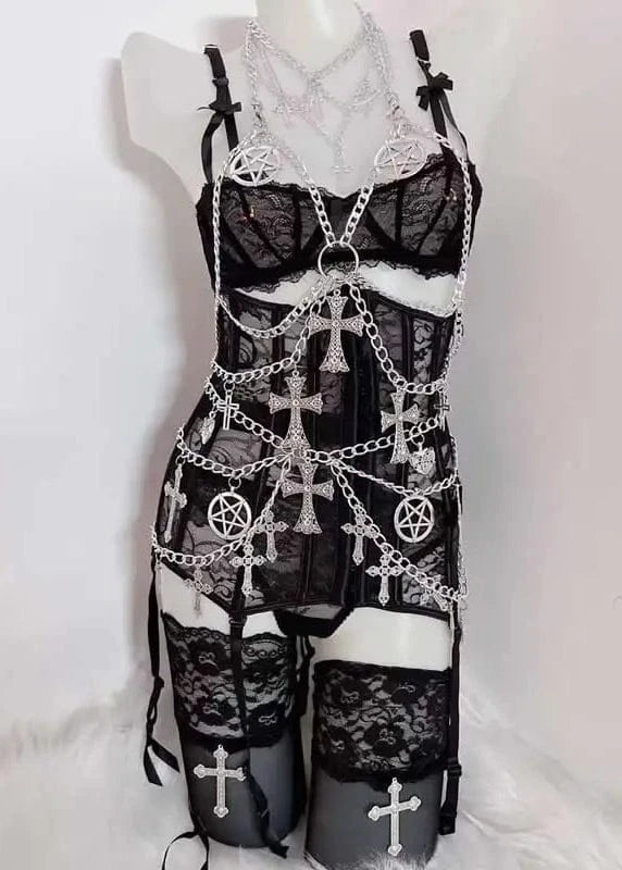 Black lace jumpsuit with silver chain and cross details on a white background