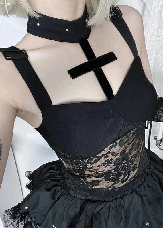Person wearing a black lace dress with a high slit and a choker in a room.