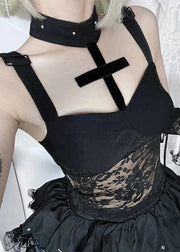 Person wearing a black lace dress with a high slit and a choker in a room.