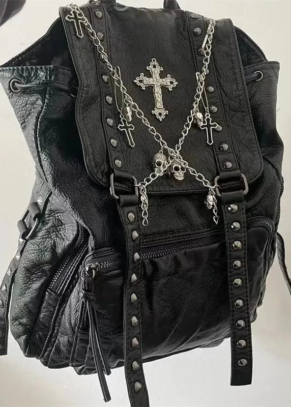 Black backpack with chains and crosses on a white background