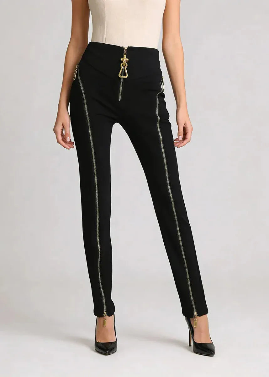 Black pants with gold zippers on a white background