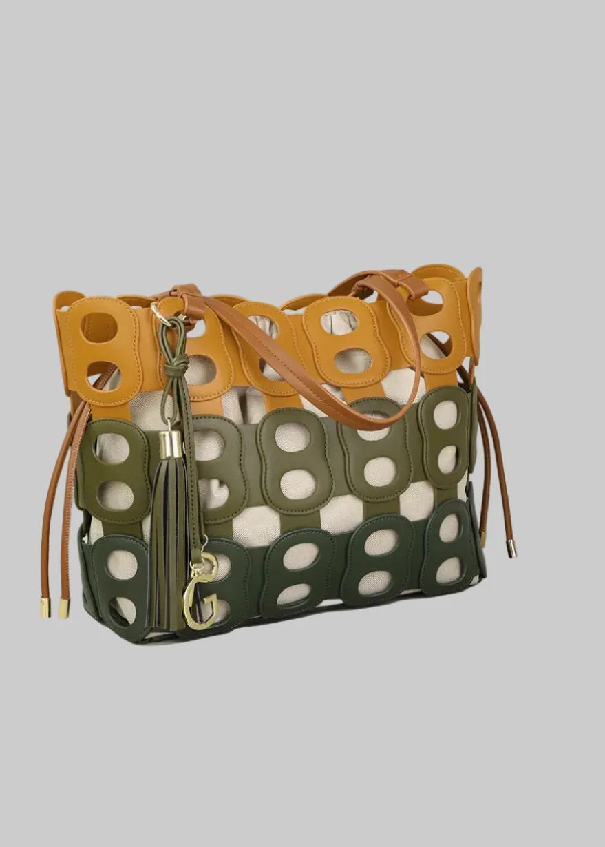Handbag with measurements on a beige background