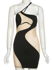 Black and beige dress on a mannequin with 'WeirdPuss' branding.