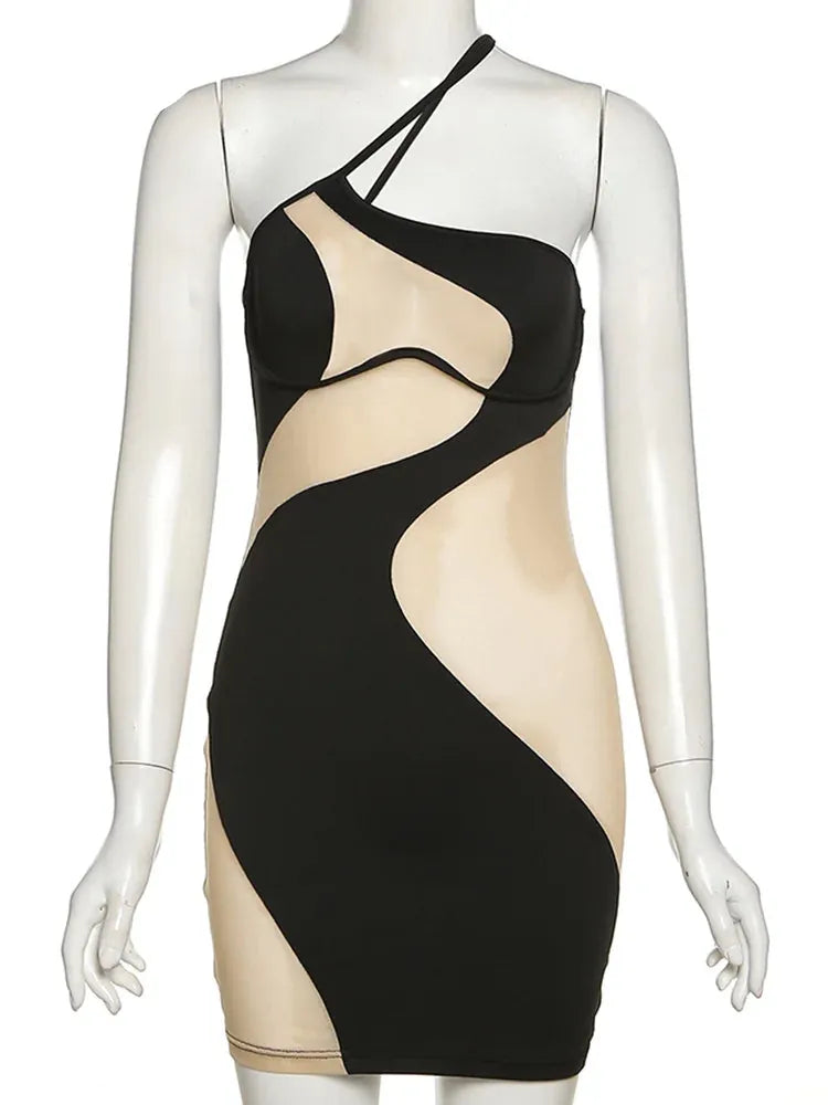 Black and beige dress on a mannequin with 'WeirdPuss' branding.
