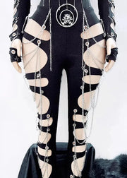 Black strappy cutout bodysuit with silver chain drapes, matching fingerless gloves, and a skull-and-crossbones pendant, shown on a mannequin against a white background.