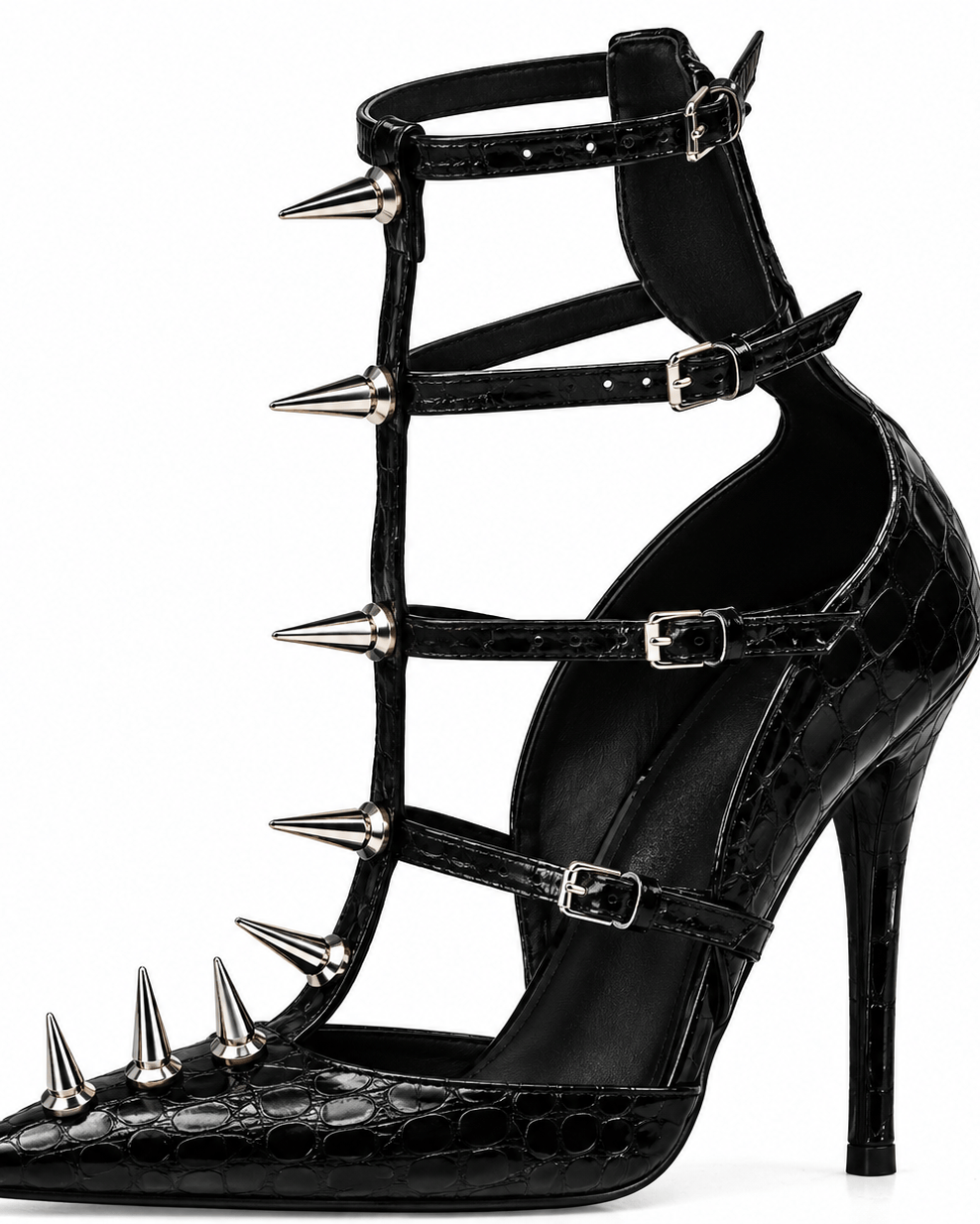 Black stiletto sandal with multiple wrap-around straps, pointed toe, and silver metal spikes, shown on a plain white background.