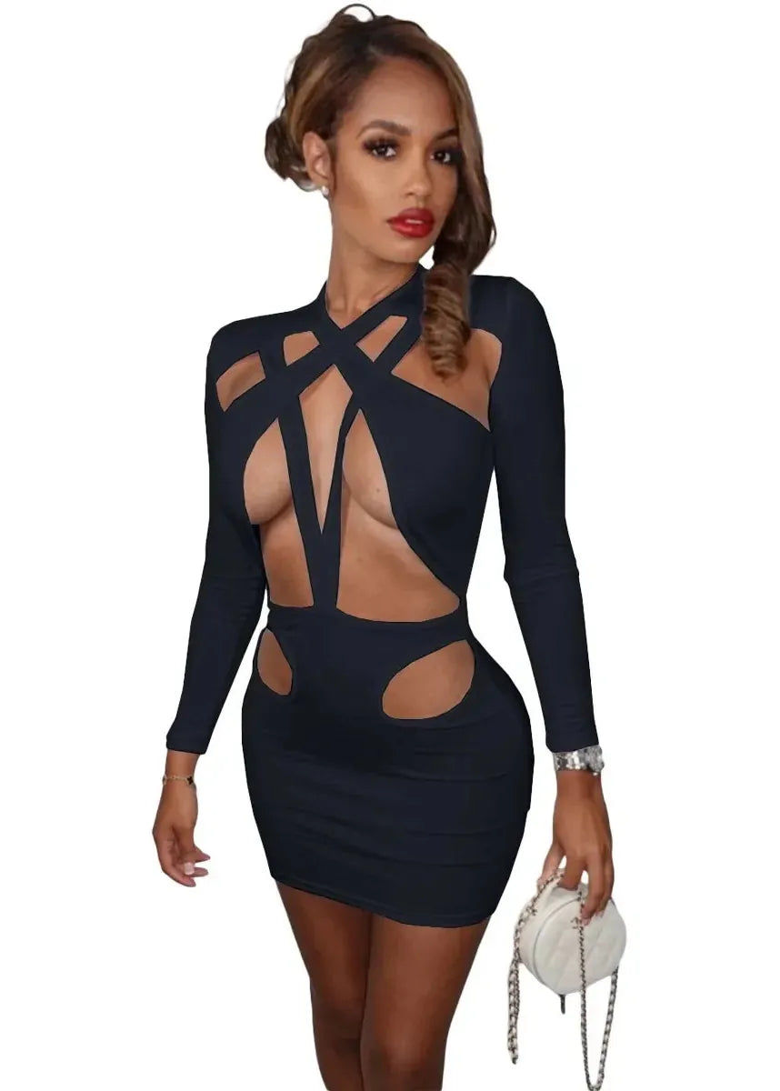 Woman wearing a black dress with cut-out design on a white background