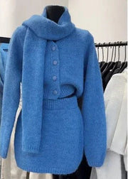 Blue knitted sweater on a mannequin against a white background