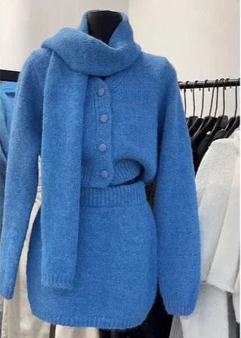 Blue knitted sweater on a mannequin against a white background